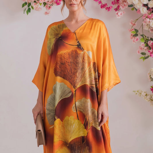 Veya Kaftan – close-up of the burnt orange abstract print