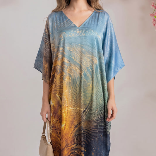 Nia Kaftan – close-up of the teal & gold floral print