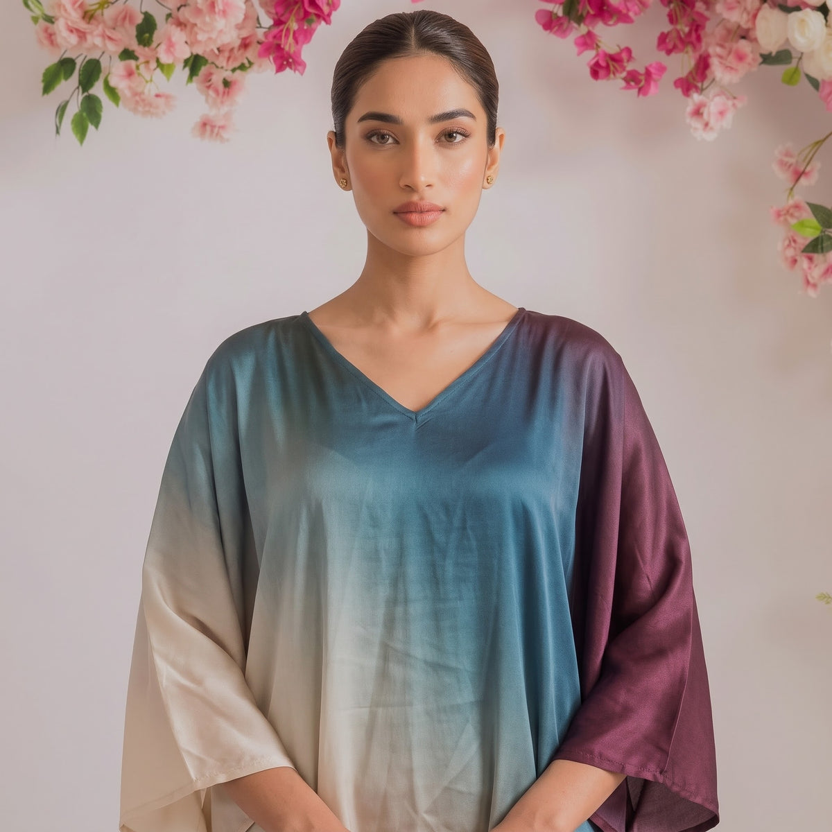 Ira Kaftan – close-up of the multicolor abstract ombré dip-dye print
