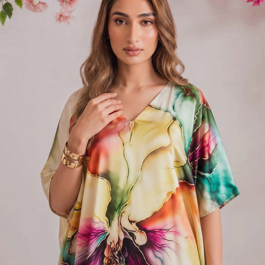 Nira Kaftan – close-up of the golden multicolor floral print
