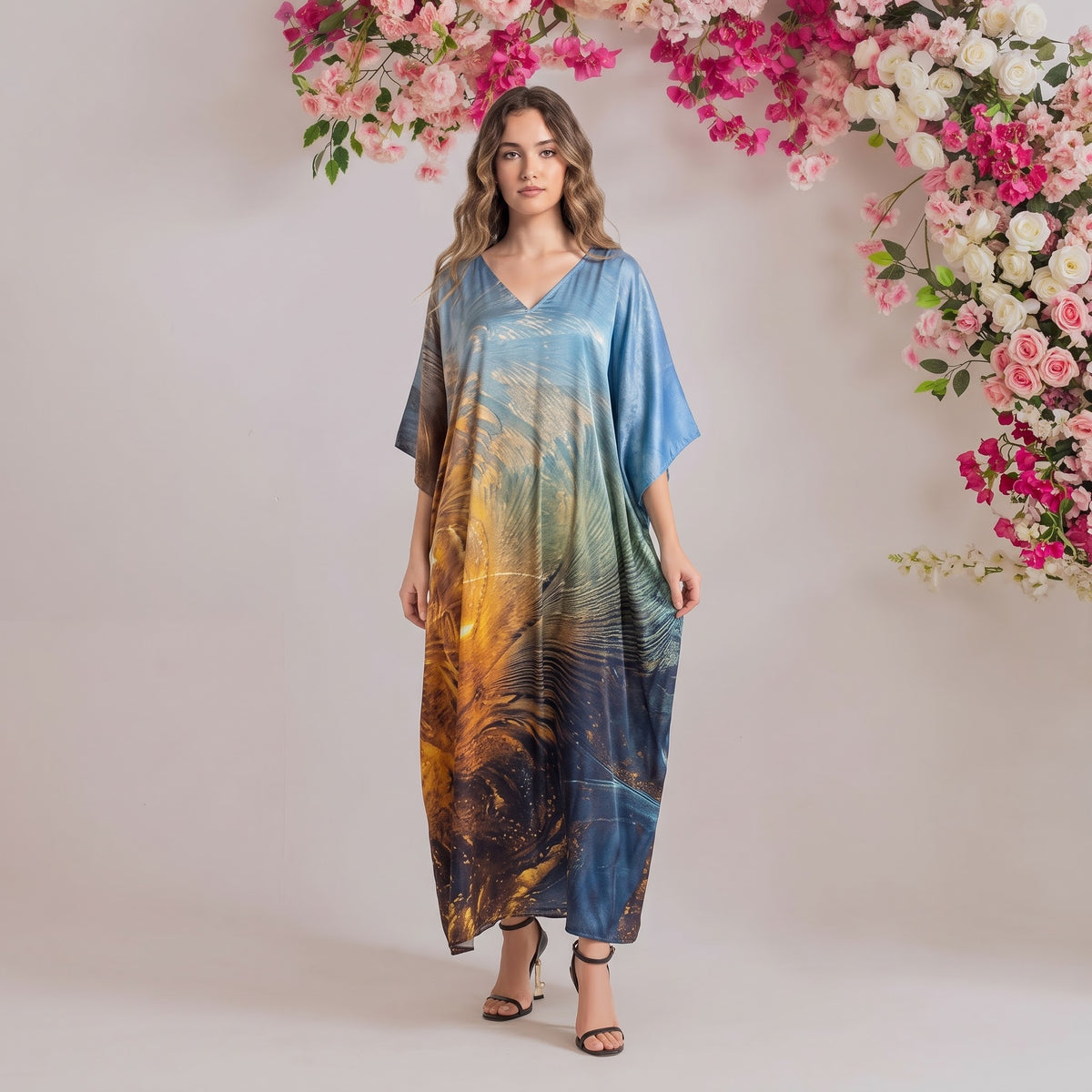 Nia Kaftan – teal & gold floral print, front view